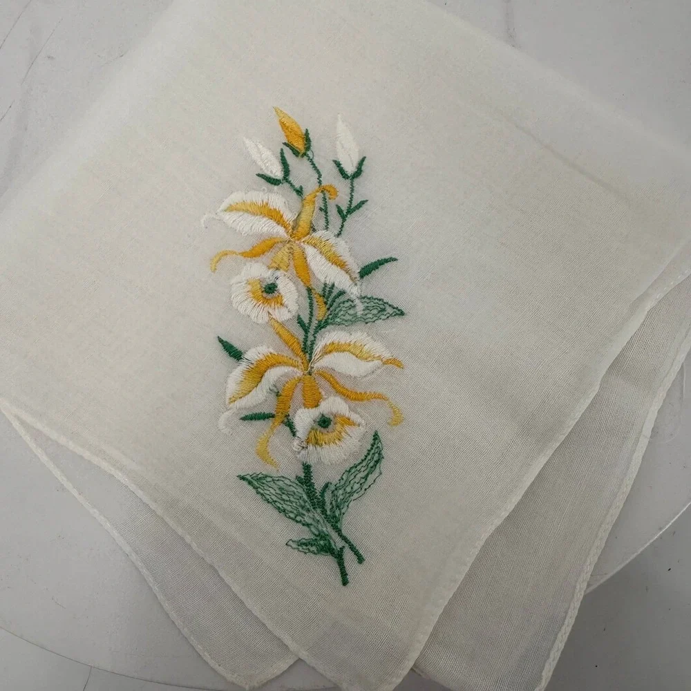 Vtg handkerchief featuring delicate yellow and green embroidered lily flowers. - Picture 2 of 4